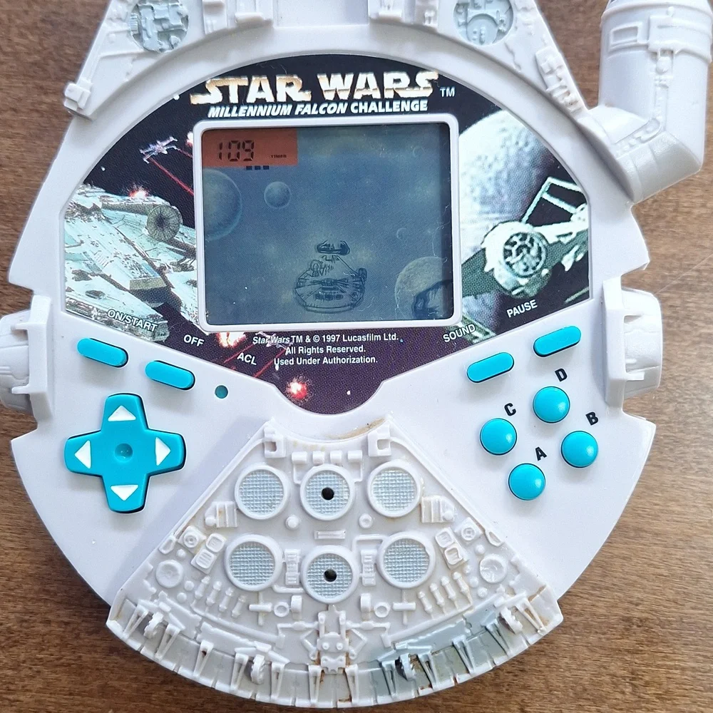 Star Wars Millennium Falcon Handheld Game - White